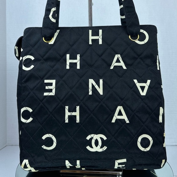 CHANEL Handbags - CHANEL Black and White Quilted Logo Shoulder Bag